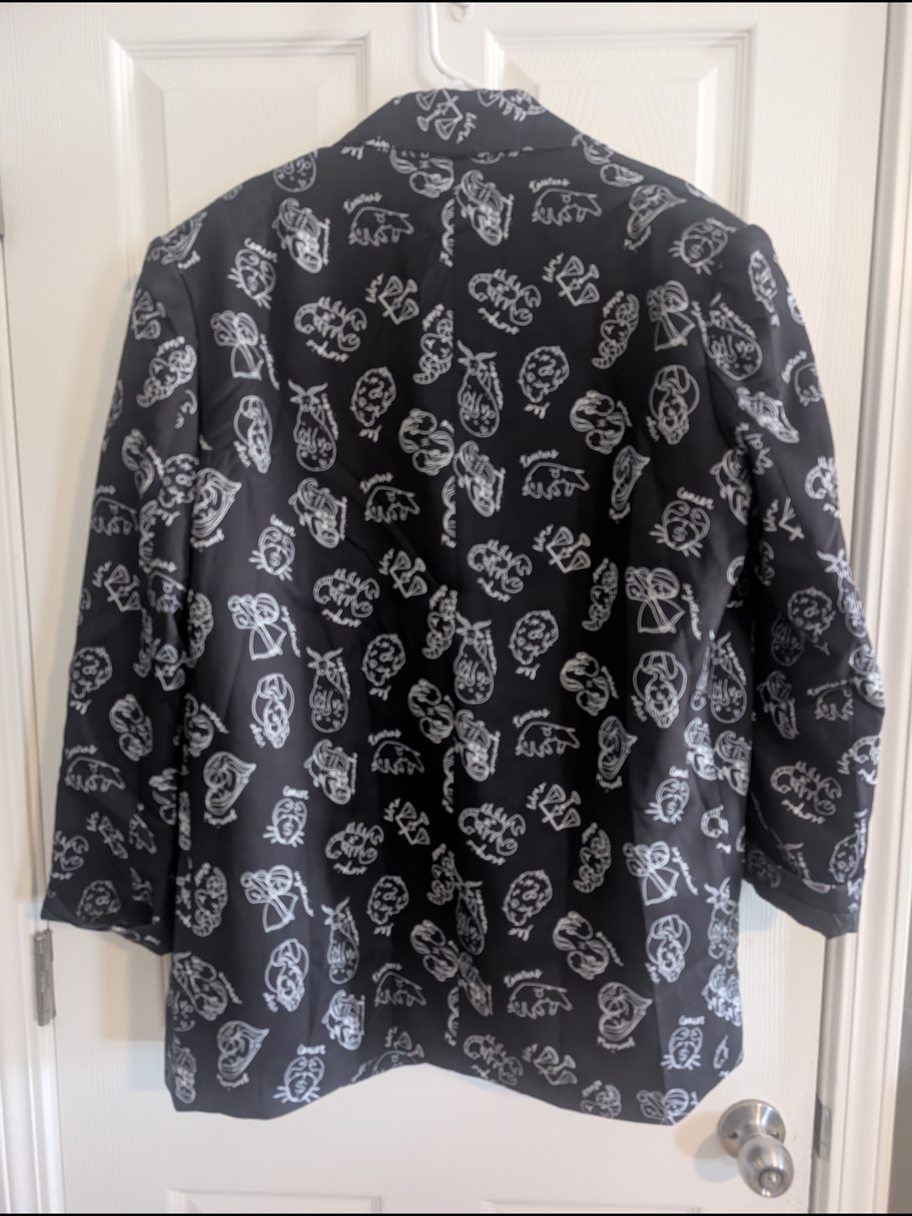 Dressed in LALA Black Blazer with White Graphic Print
